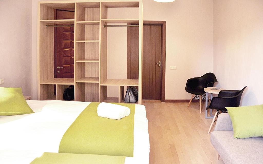 Postel nebo postele na pokoji v ubytování Boutique Hotel Avlabar