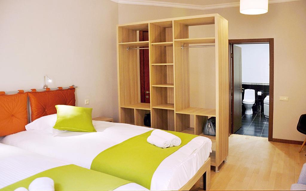 Postel nebo postele na pokoji v ubytování Boutique Hotel Avlabar