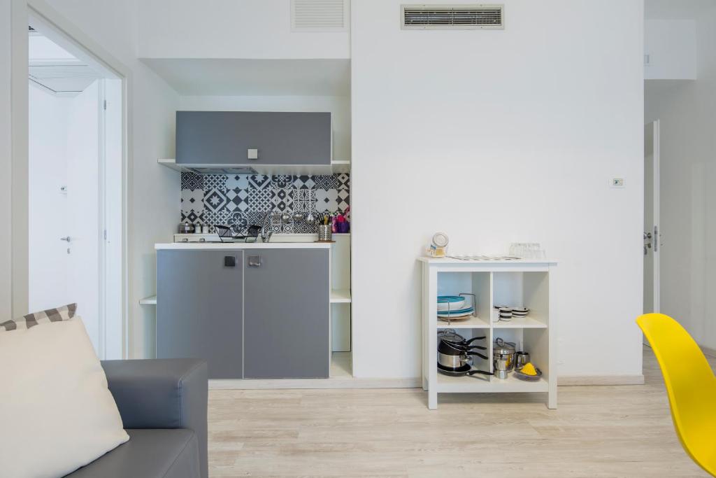 Kuchyň nebo kuchyňský kout v ubytování Flower Suites Sorrento