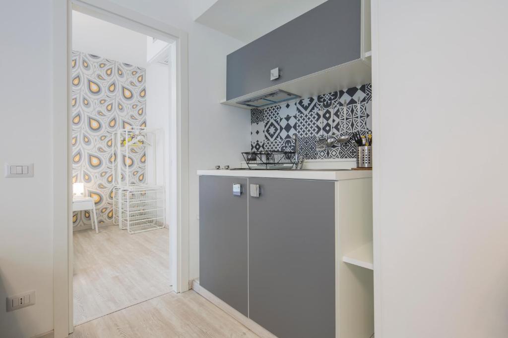 Kuchyň nebo kuchyňský kout v ubytování Flower Suites Sorrento