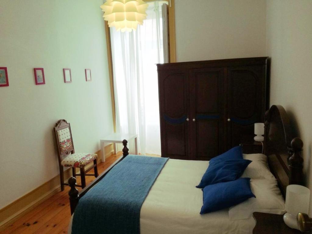 Postel nebo postele na pokoji v ubytování A Vianesa - Guest House