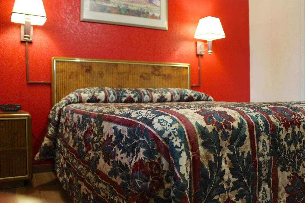 Postel nebo postele na pokoji v ubytování Starlite Motel
