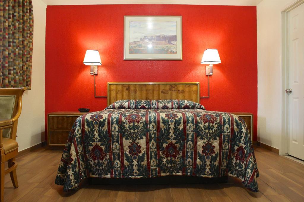 Postel nebo postele na pokoji v ubytování Starlite Motel