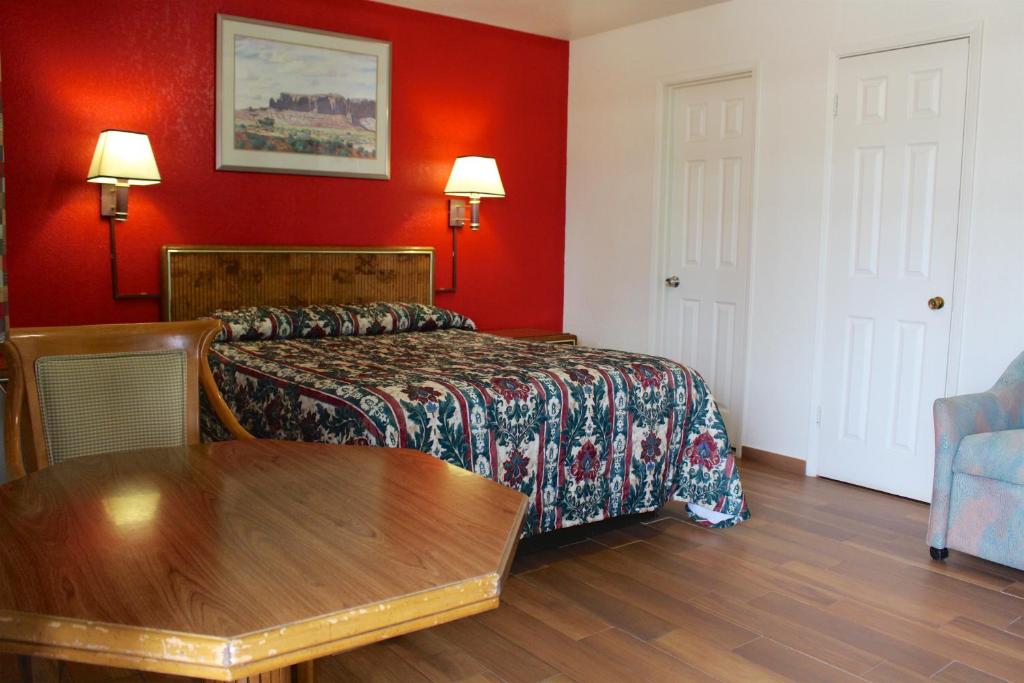 Postel nebo postele na pokoji v ubytování Starlite Motel