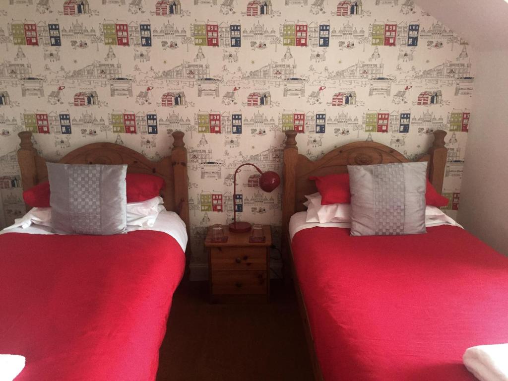 Postel nebo postele na pokoji v ubytování The Arrandale Hotel