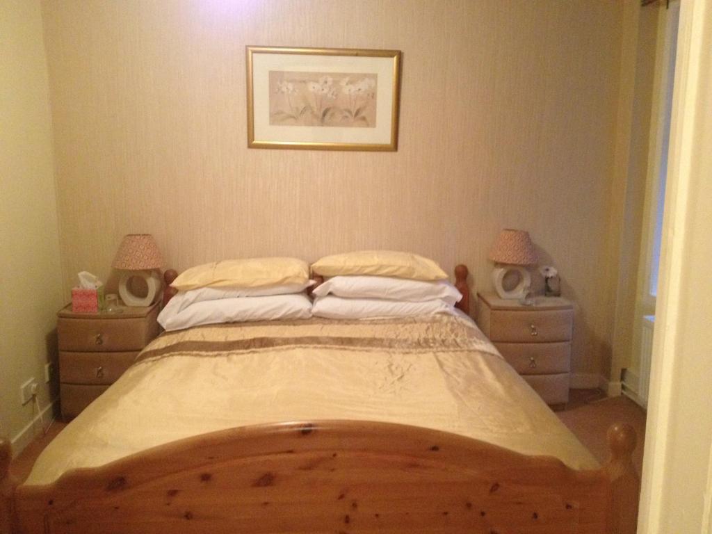 Postel nebo postele na pokoji v ubytování The Arrandale Hotel