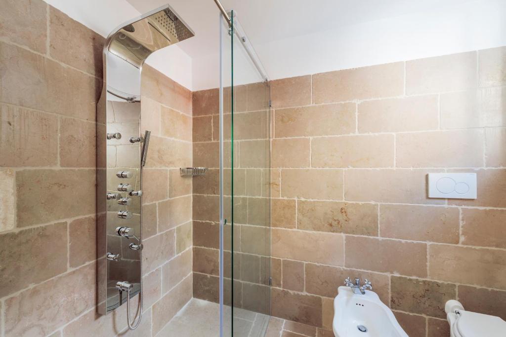 a bathroom with a shower and a sink at Casa Malu in Positano