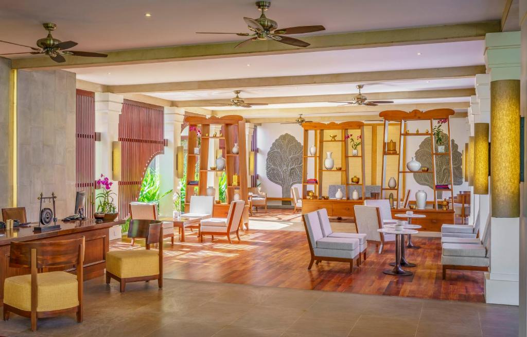 Posezení v ubytování Anantara Angkor Resort