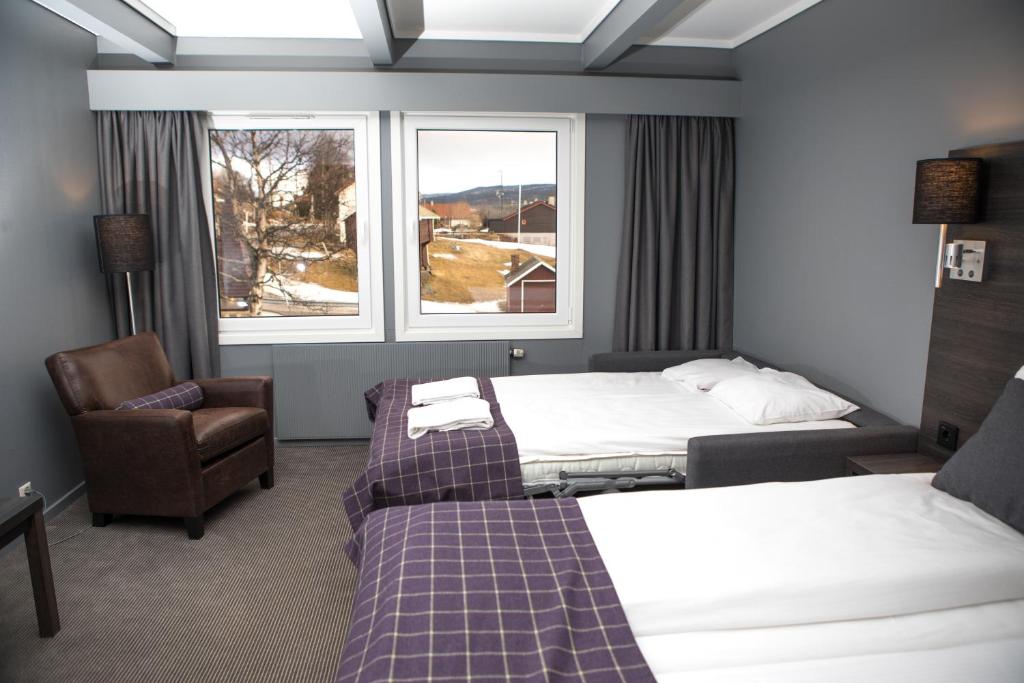 Postel nebo postele na pokoji v ubytování Geilo Hotel
