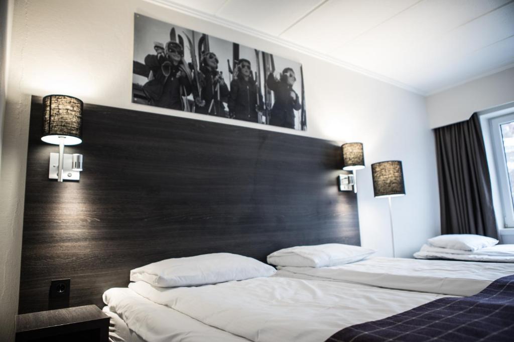 Postel nebo postele na pokoji v ubytování Geilo Hotel