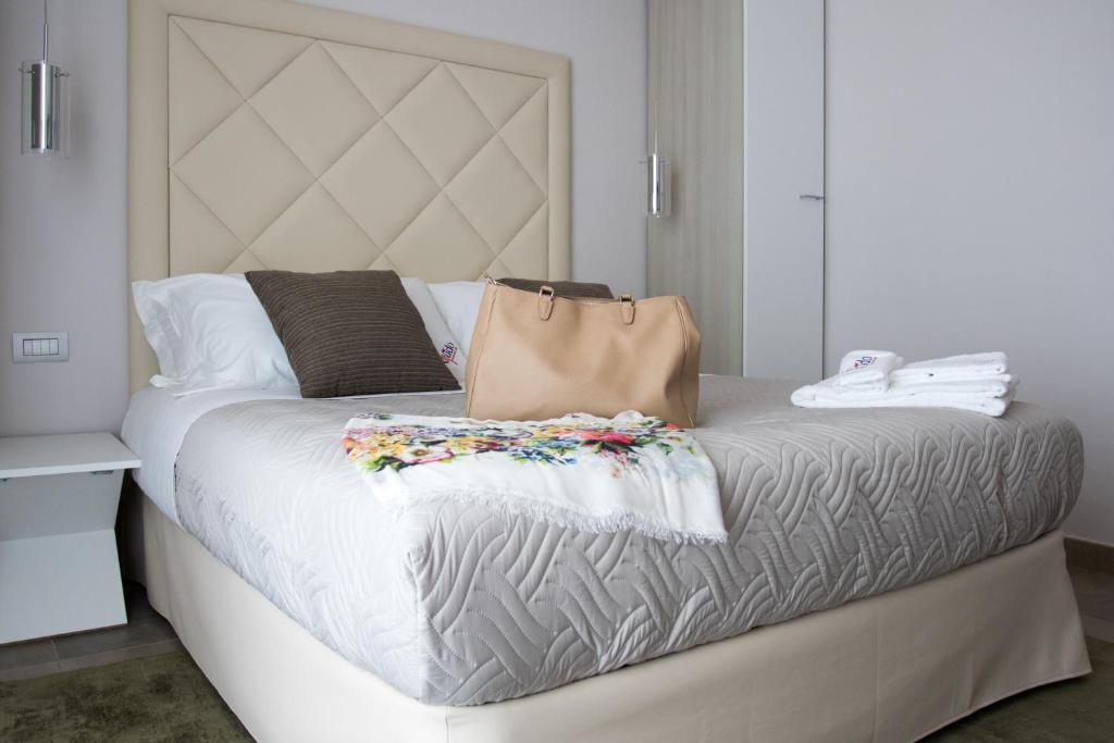 Postel nebo postele na pokoji v ubytování Alludo Aparthotel b&b