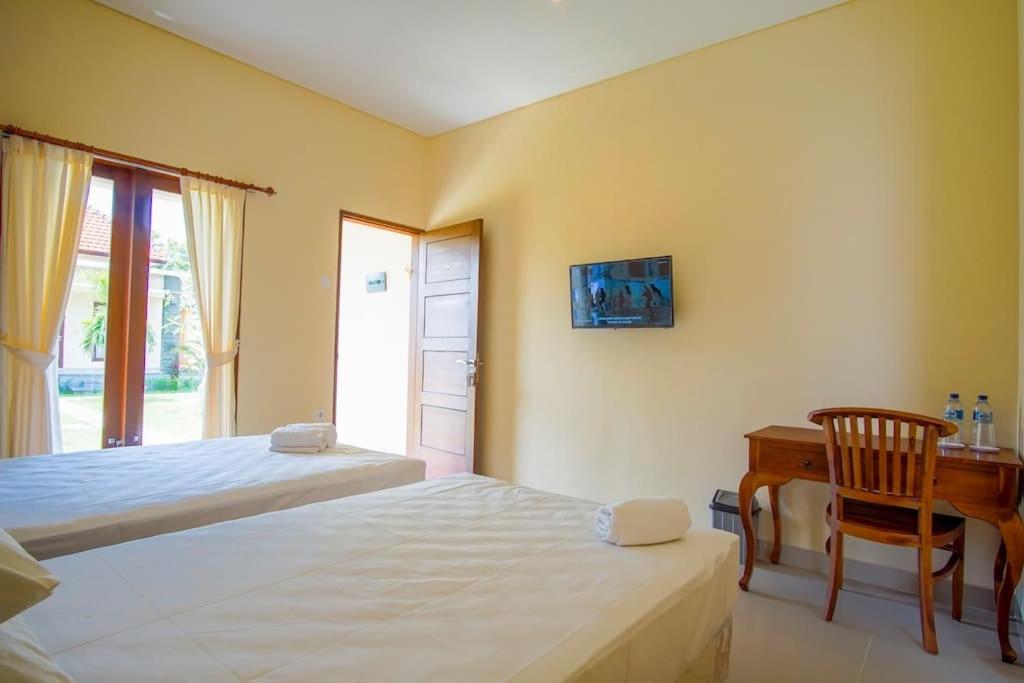 Kutuh Manak Guest House - Kutuh Manak Twin Room