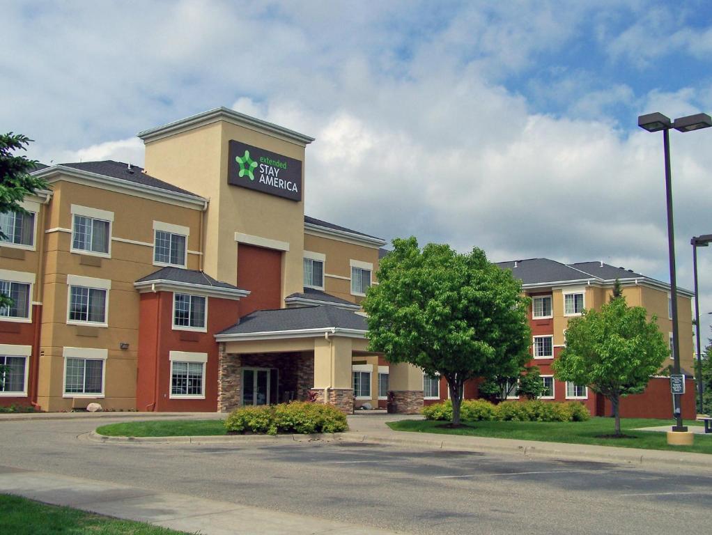 a hotel building with a sign on top of it at Extended Stay America Suites - Minneapolis - Airport - Eagan - North in Eagan