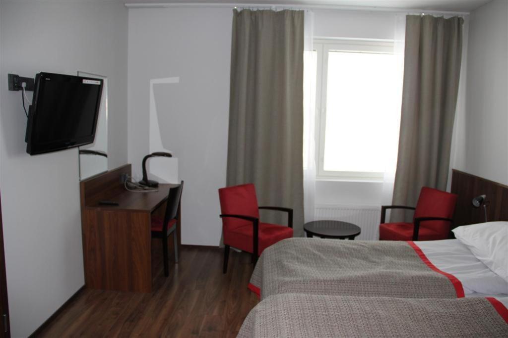 TV a/nebo společenská místnost v ubytování Motel SEO Muonio