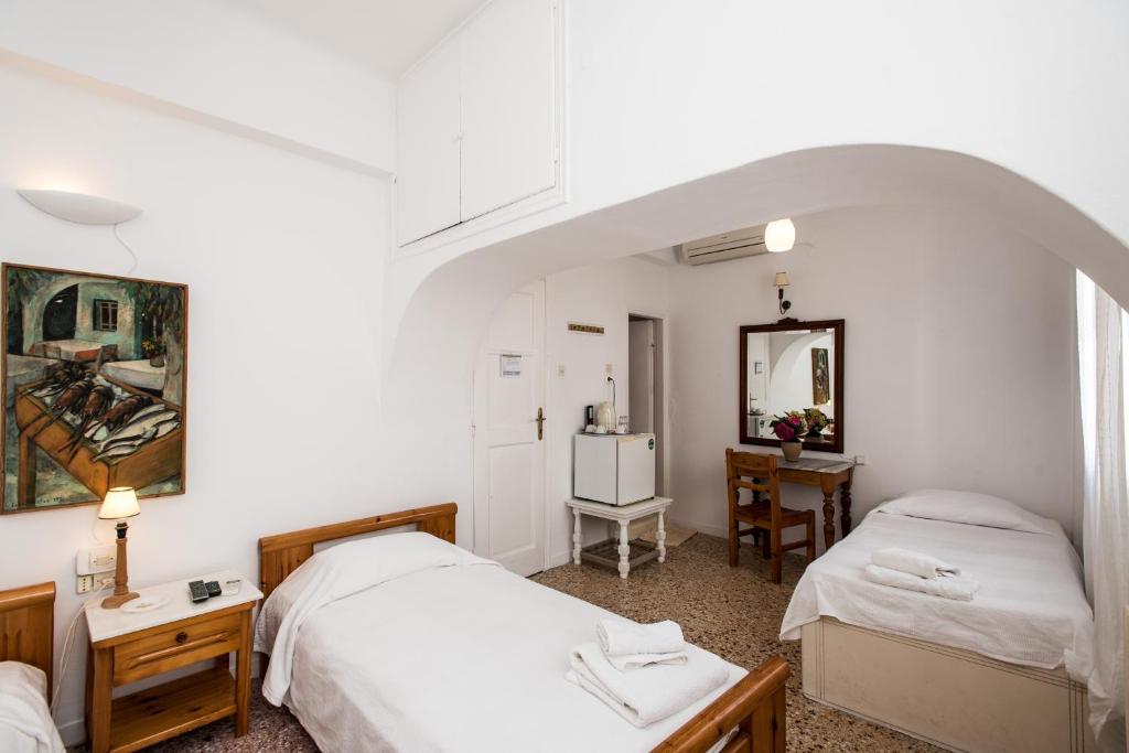 Voodi või voodid majutusasutuse Hotel Delphines toas