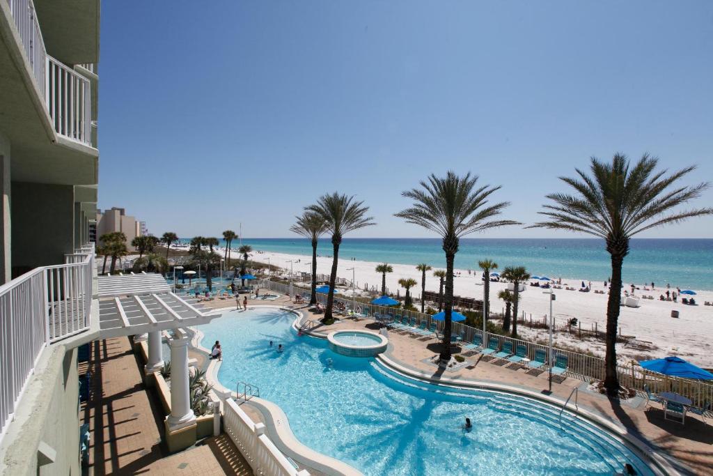 a view of the beach from the balcony of a resort at Boardwalk Beach Resort by Panhandle Getaways in Panama City Beach