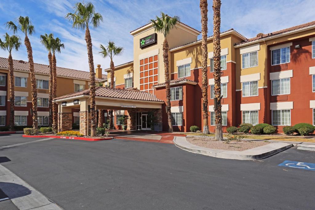 
a large building with a clock on the front of it at Extended Stay America Suites - Las Vegas - Midtown in Las Vegas
