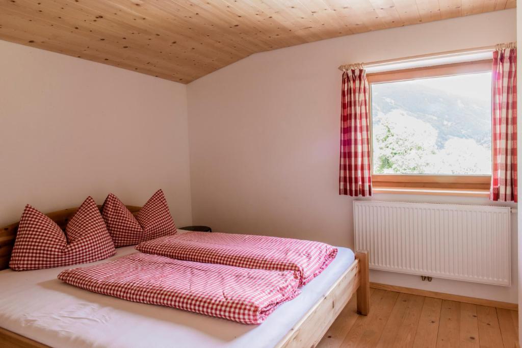 Postel nebo postele na pokoji v ubytování Haus Silberberg
