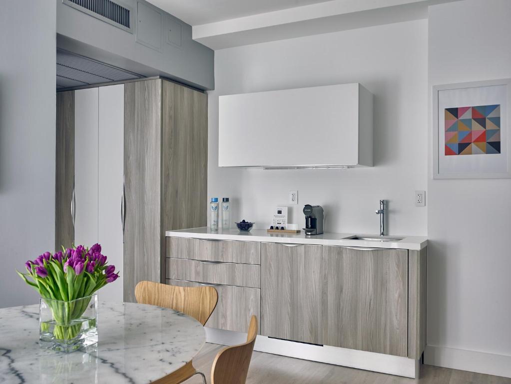 Kuchyň nebo kuchyňský kout v ubytování ABAE Hotel by Eskape Collection