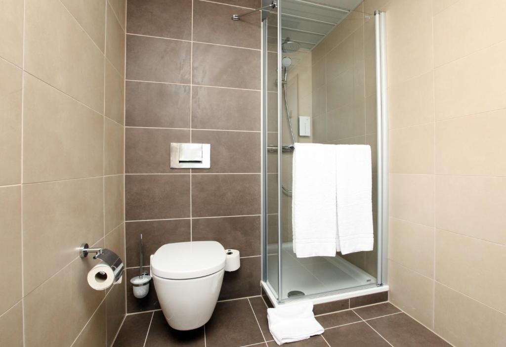 Koupelna v ubytování Golden Tulip Kassel Hotel Reiss