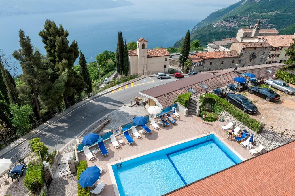 an aerial view of a resort with a swimming pool at Hotel Bellavista in Tignale