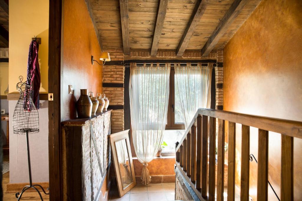 Posteľ alebo postele v izbe v ubytovaní Casa Rural la Casa del Bosque