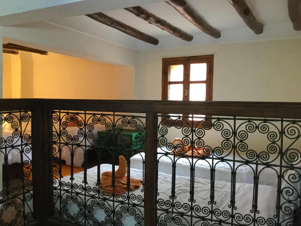 Postel nebo postele na pokoji v ubytování Riad Zanzibar