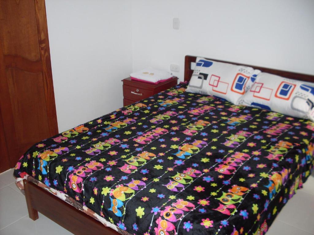Postel nebo postele na pokoji v ubytování Hotel Internacional Jardín