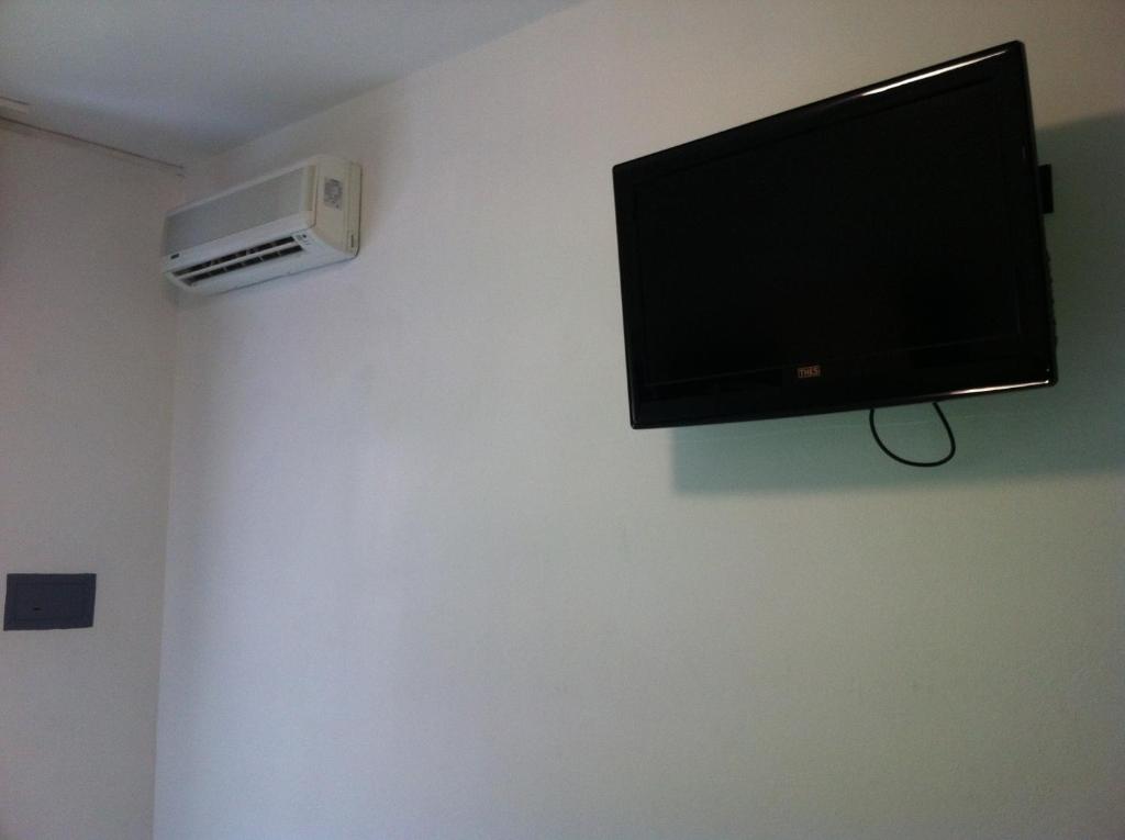 TV a/nebo společenská místnost v ubytování Hotel Olanda