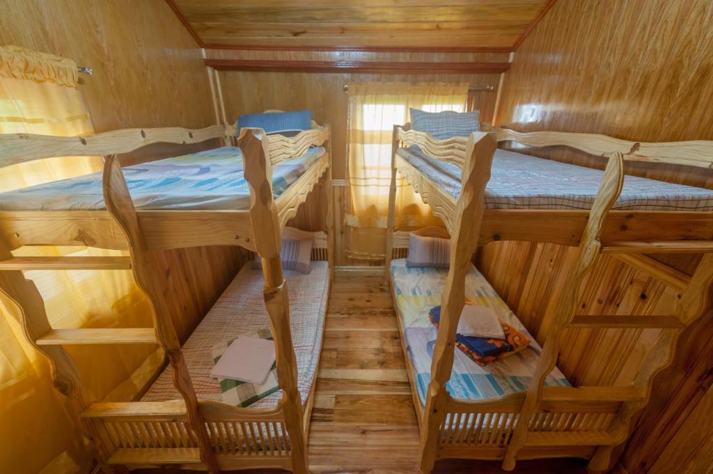 Postel nebo postele na pokoji v ubytování Rice Homestay