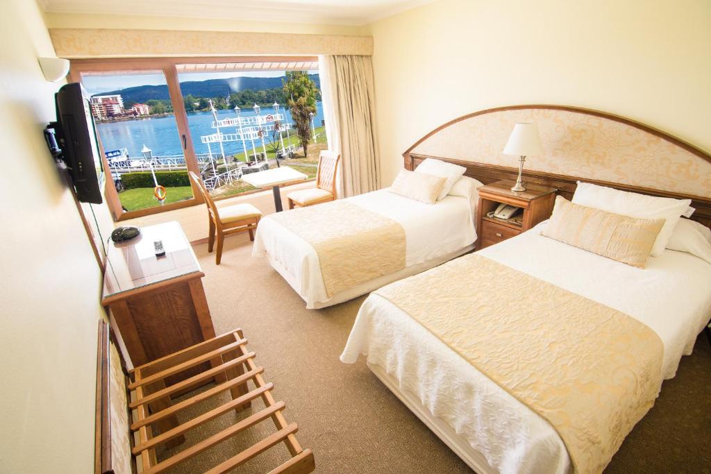 Postel nebo postele na pokoji v ubytování Hotel Marina Villa del Rio