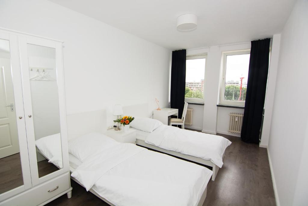 Postel nebo postele na pokoji v ubytování MAC City Hostel
