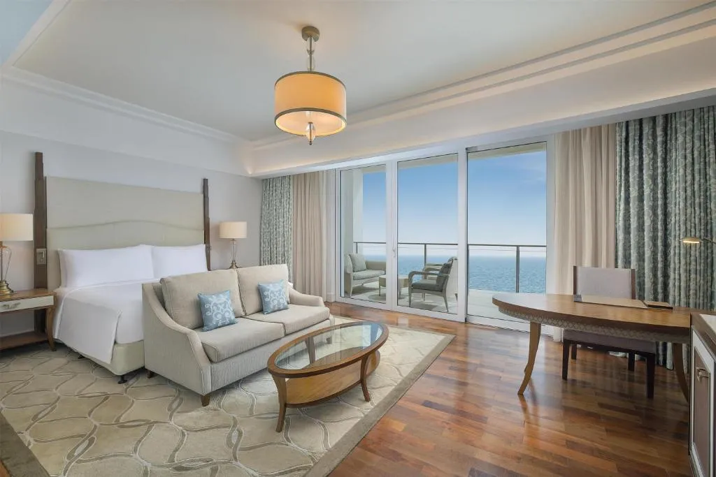 Family Connecting Room with One King Bed and Two Queen Beds