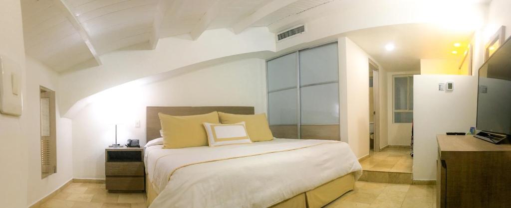 Postel nebo postele na pokoji v ubytování Hotel Casablanca
