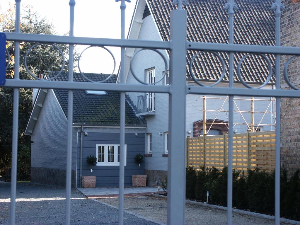 a view of a house through a window at B & B De Bleker in Bruges