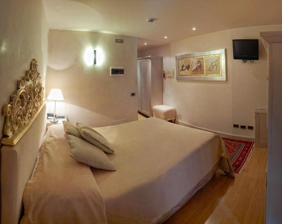 Postel nebo postele na pokoji v ubytování Hotel Liassidi Palace