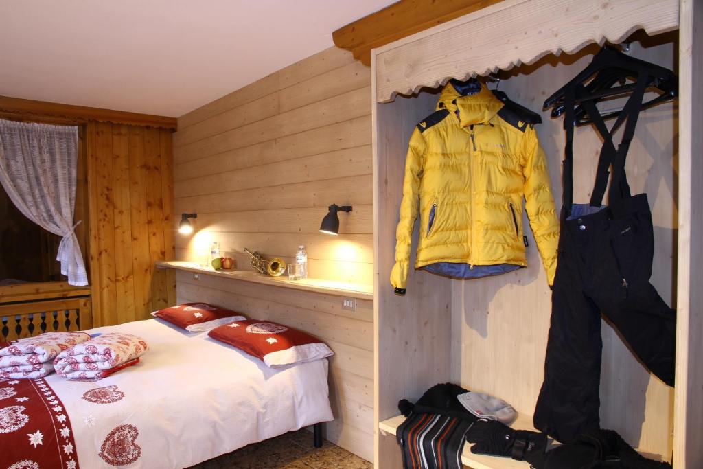 Postel nebo postele na pokoji v ubytování Chalet dell'Ermellino