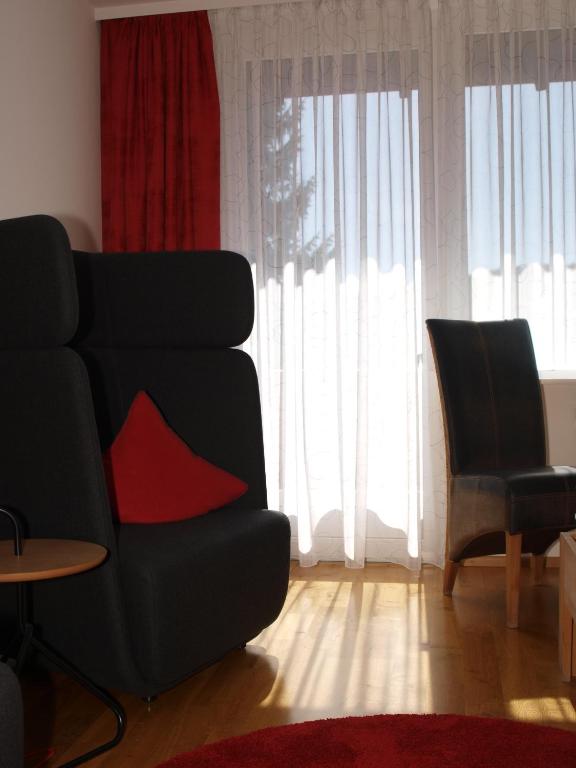 Posezení v ubytování Hotel Restaurant Peterle