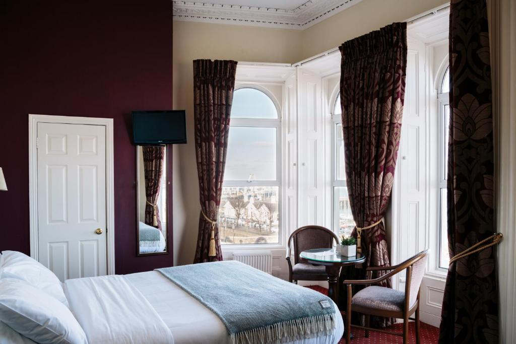 Ένα ή περισσότερα κρεβάτια σε δωμάτιο στο Haddington House