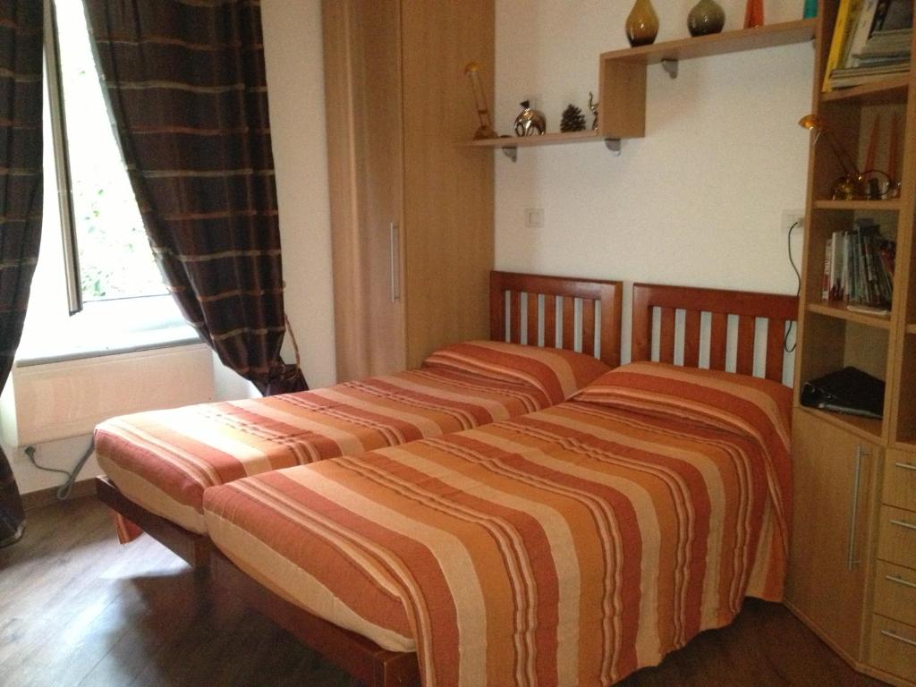 Posteľ alebo postele v izbe v ubytovaní Doria Suites