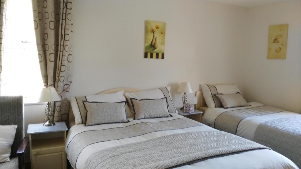 Postel nebo postele na pokoji v ubytování Atlantic House B&B