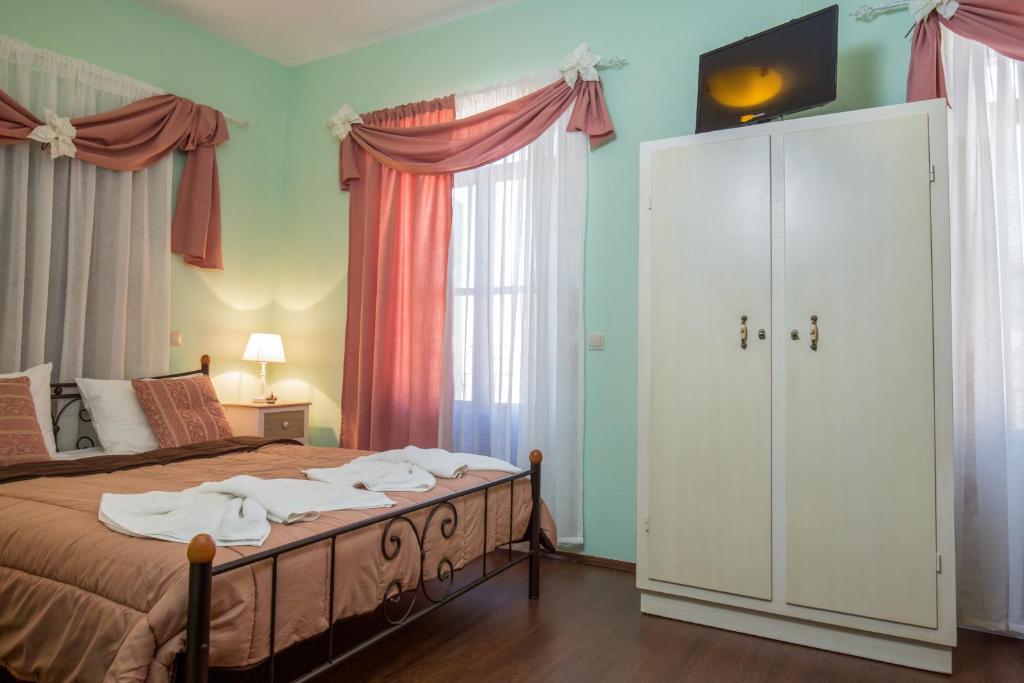 Łóżko lub łóżka w pokoju w obiekcie Casa Di Porto