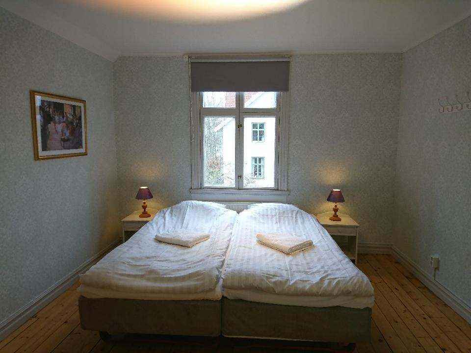 Postel nebo postele na pokoji v ubytování STF Glasbruket Hostel & Apartments