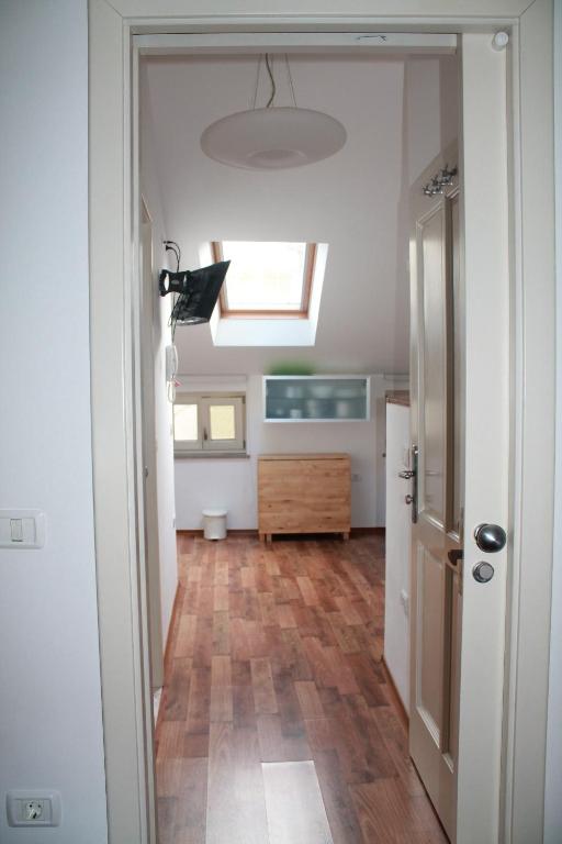 Ένα ή περισσότερα κρεβάτια σε δωμάτιο στο Apartma Via Flavia