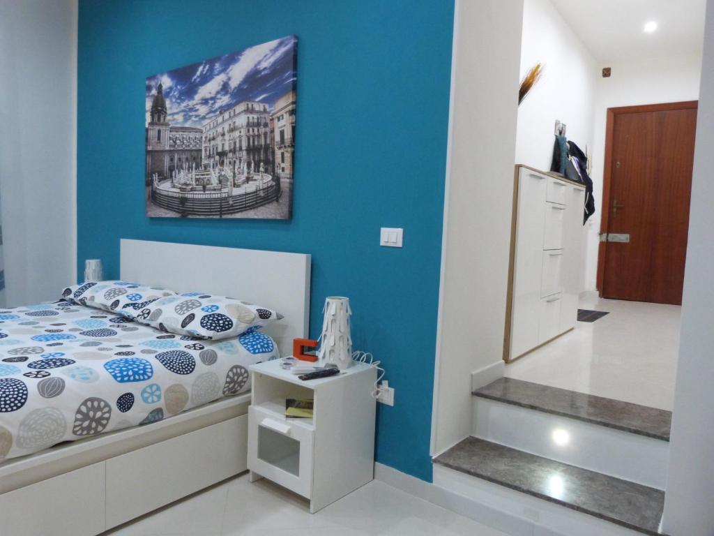 A bed or beds in a room at Casa Principe Maqueda
