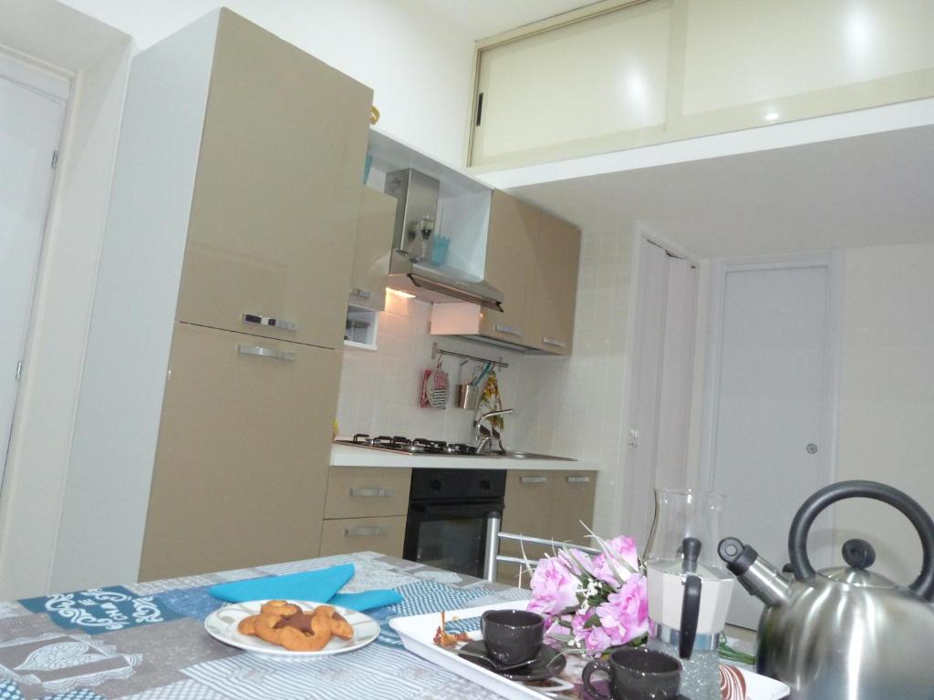 A kitchen or kitchenette at Casa Principe Maqueda