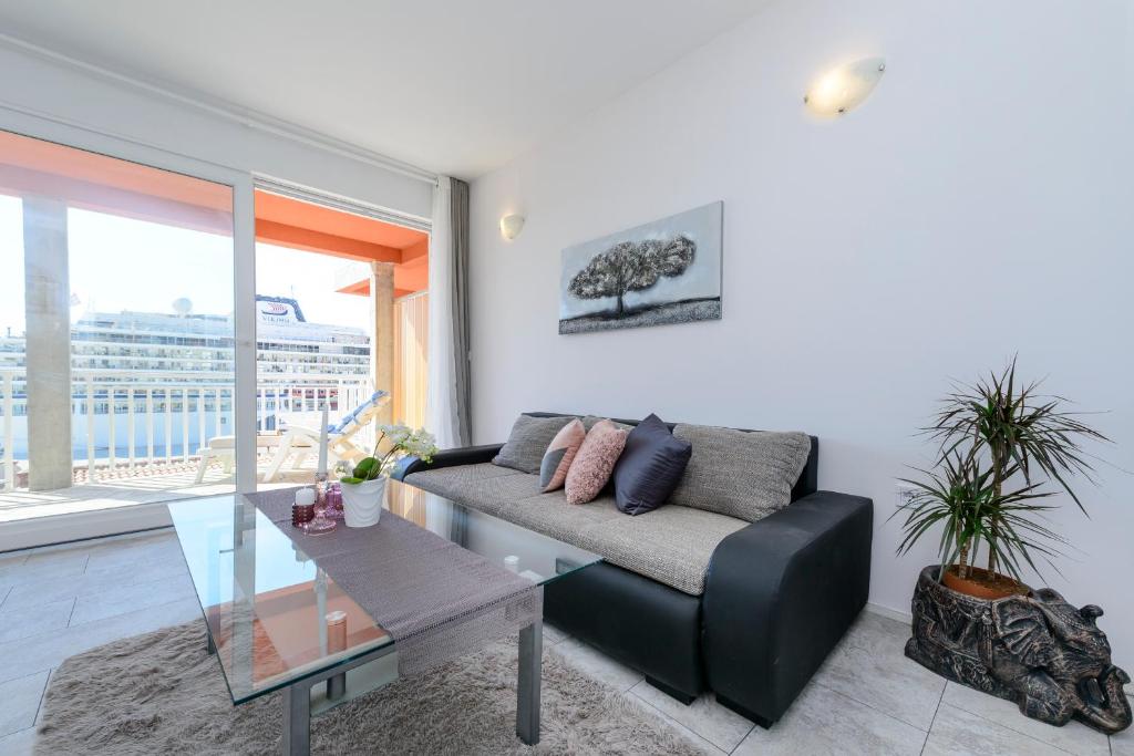 Posedenie v ubytovaní Lorelai Apartments