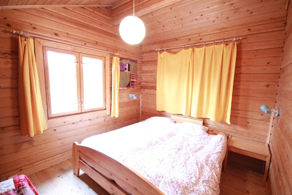 Postel nebo postele na pokoji v ubytování Ferienhaus Holzer Stressless