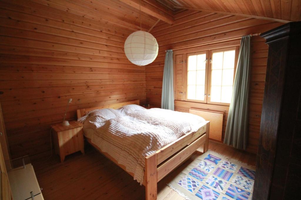 Postel nebo postele na pokoji v ubytování Ferienhaus Holzer Stressless