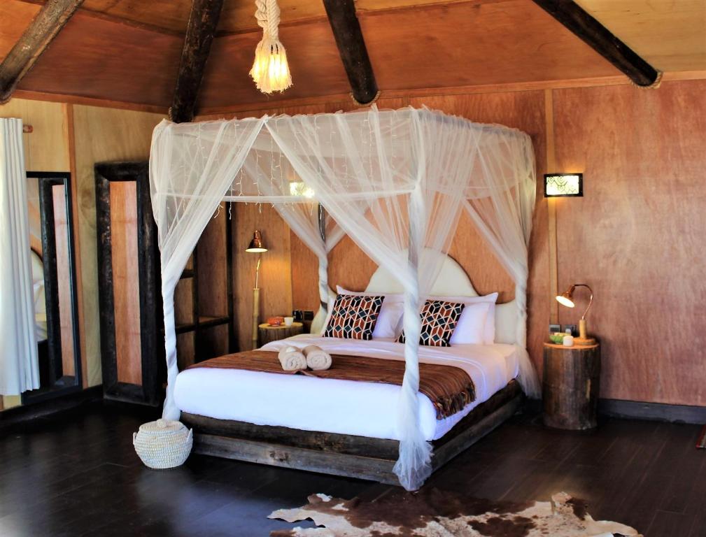 Postel nebo postele na pokoji v ubytování Souly Ecolodge Salalah